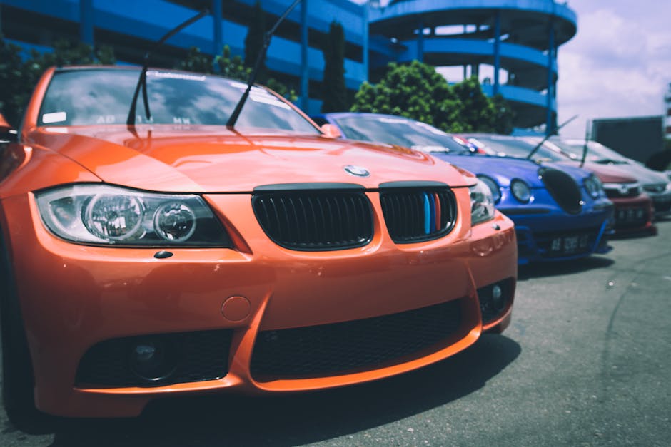 Vibrant BMW cars parked outdoors showcasing an array of colors and designs